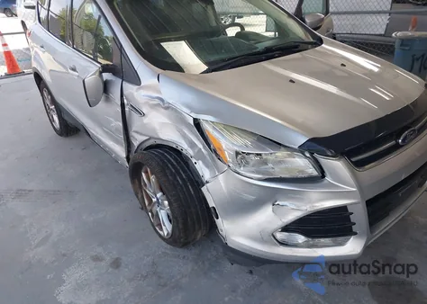 2013 Ford Escape Sel z USA, uszkodzony, nr VIN 1FMCU9H99DUB29583